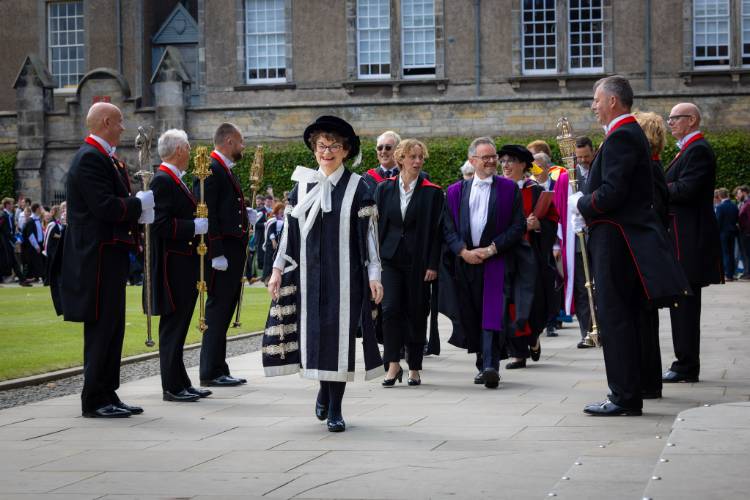 Professor Dame Sally Mapstone leading a group of dignitaries during a graduation ceremony in summer 2025