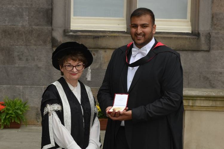 A S Bhandal receiving the Principal's Medal from Professor Dame Sally Mapstone