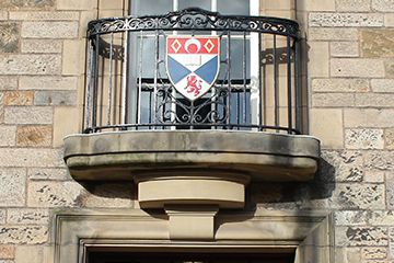 Crest above the door to College Gate
