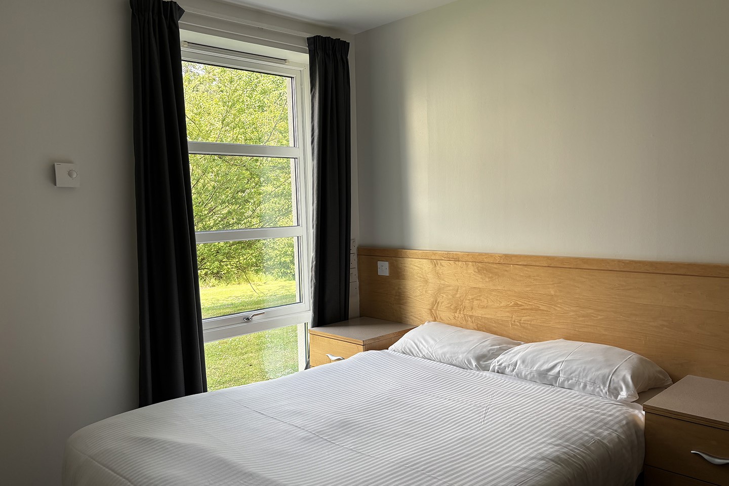 Bedroom space in David Russell Apartments