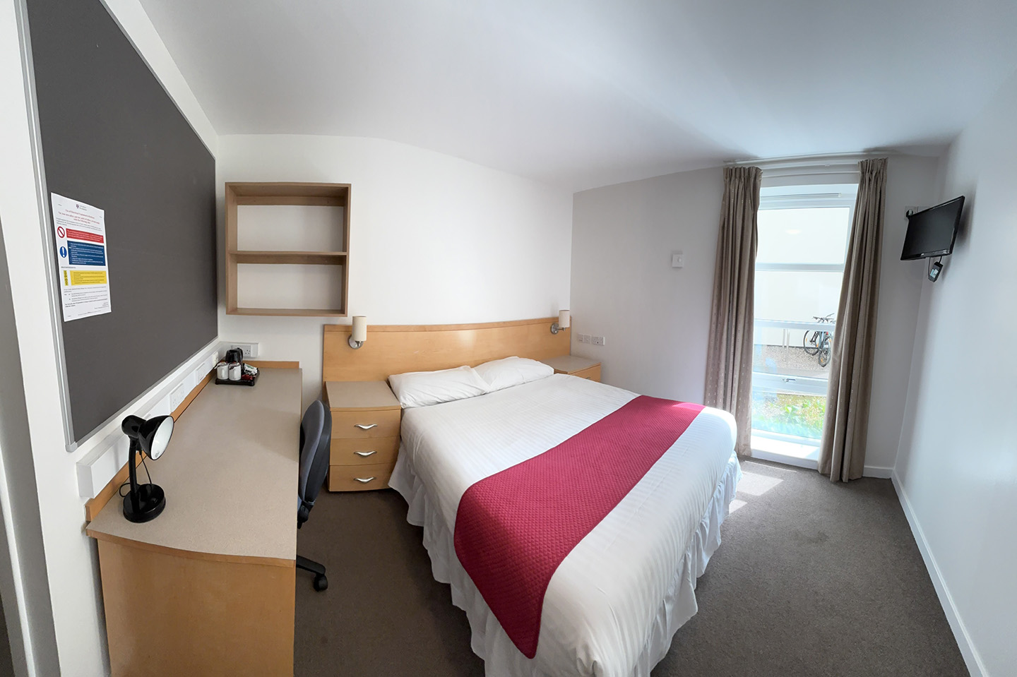 Bedroom space in David Russell Apartments