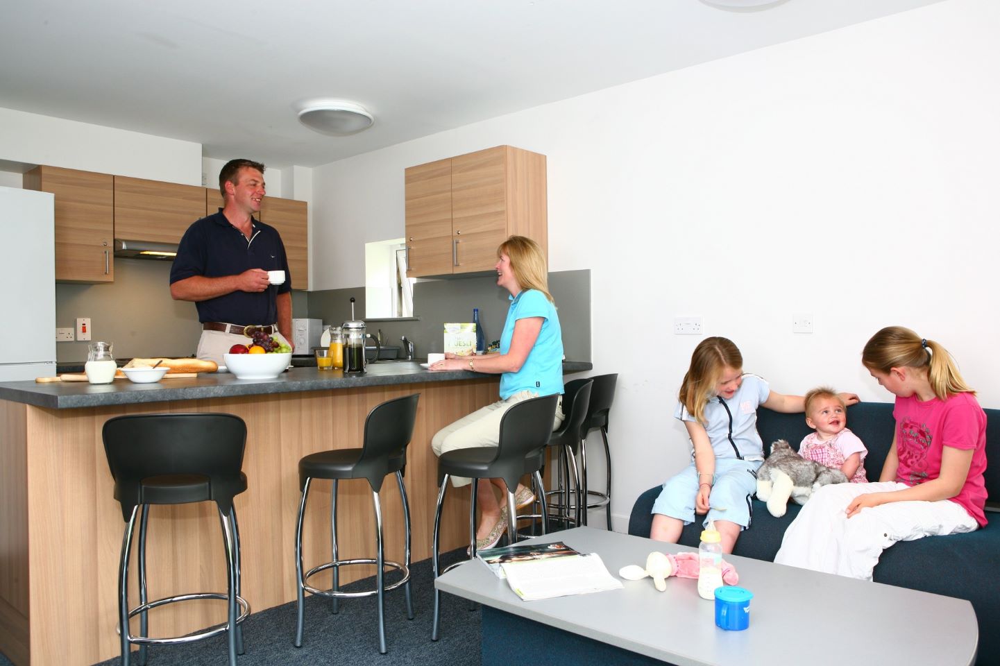 Family in David Russell Hall lounge area