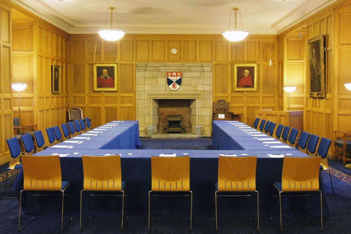 Chairs facing a fireplace in Parliament Hall