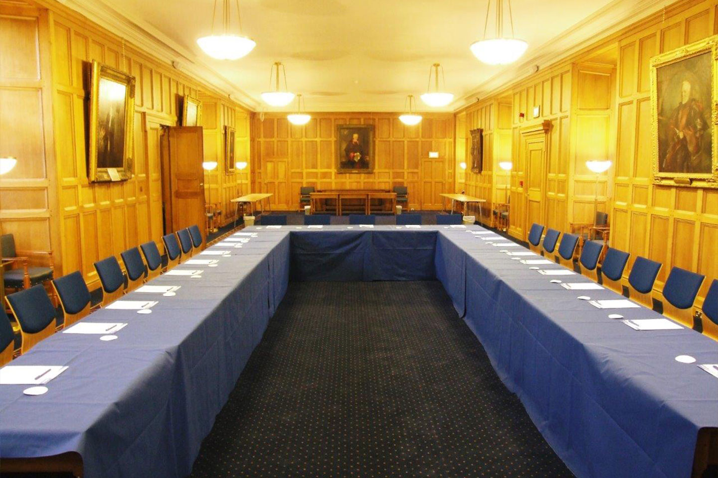 Tables with conference materials in Parliament Hall