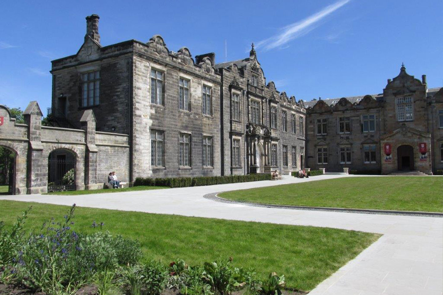 Side view of exterior and lawn of Upper College Hall