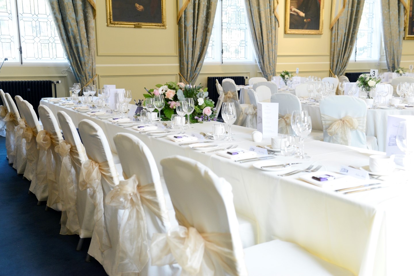 Top table set for a wedding reception in Lower College Hall