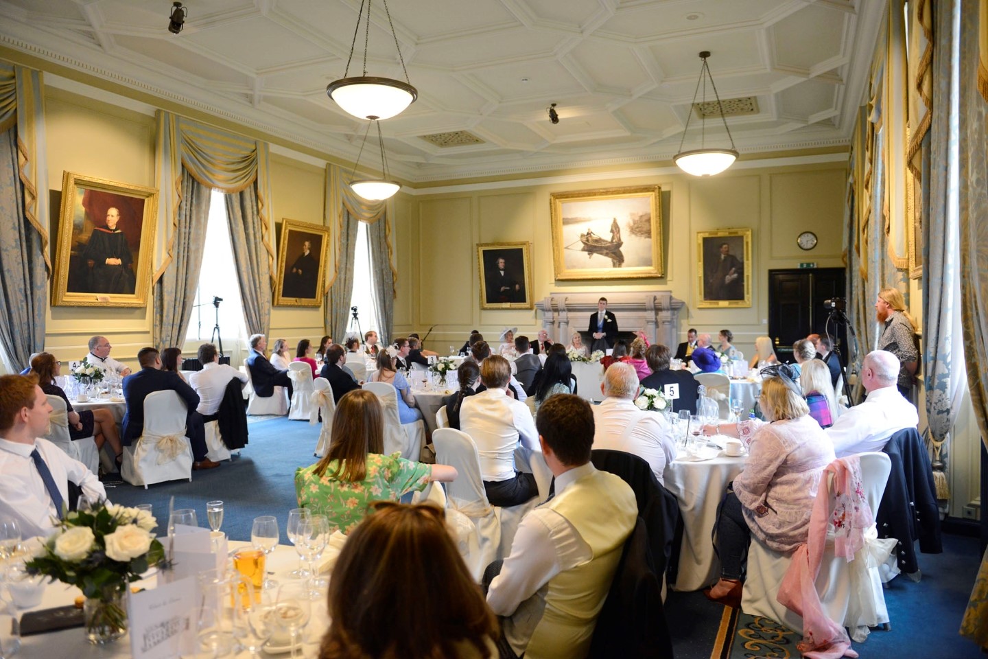 Rounds with guests at a wedding reception in Lower College Hall