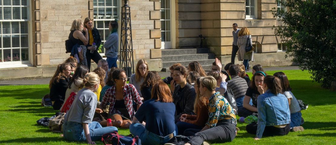 Students gathering outside in St Marys Quad, University of St Andrews