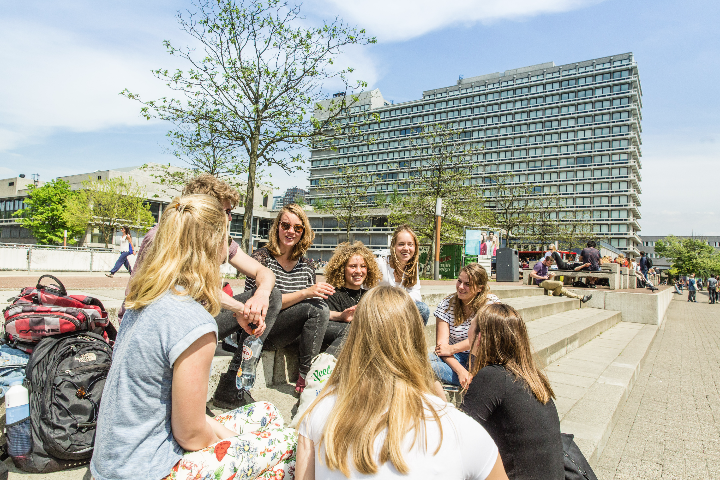 Students chat together on VU campus steps