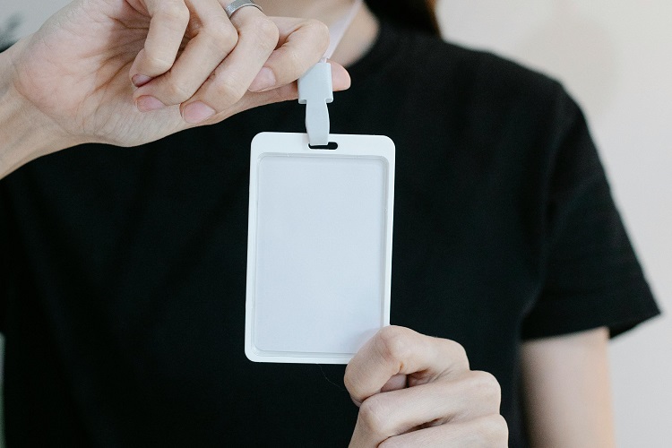 Someone holding an ID card
