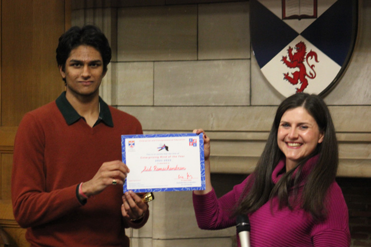 Sid Ramanchandran receiving his EMOY award from Gosia Mitka