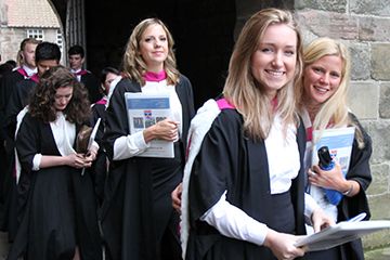 St Andrews graduates posing for a photograph together