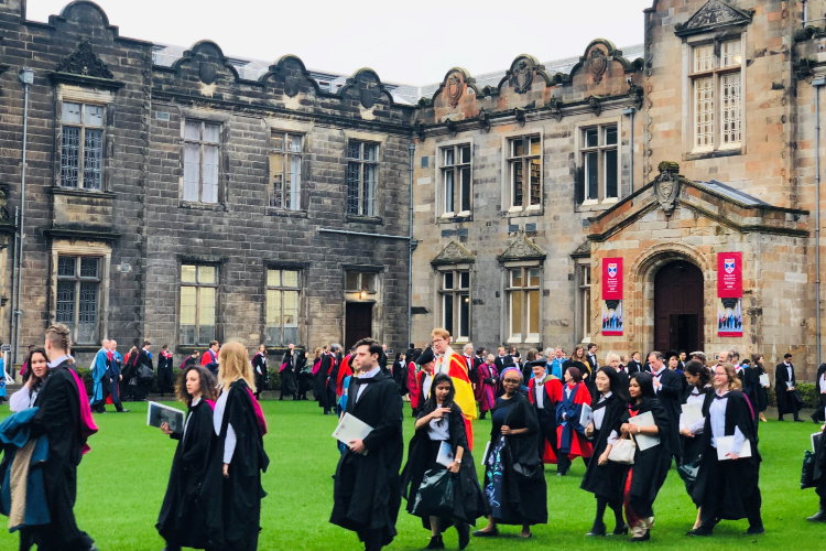 Students process around the Quad for winter graduation 2018