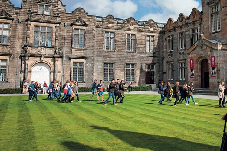 Students walking through St Salvator's Quadrangle