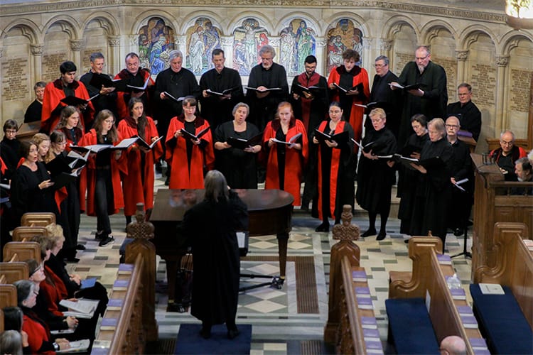 A choir performing in a chapel