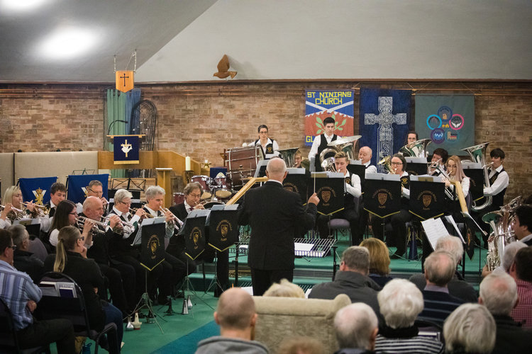 A community band playing a concert