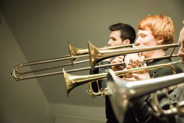 Students playing trombones