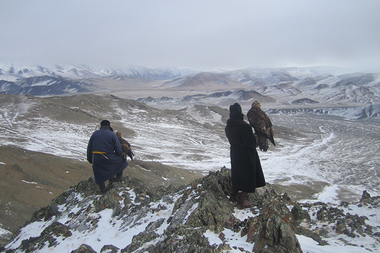 Hunters with eagles