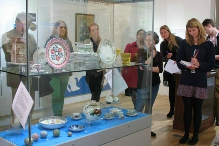 Museum and Galleries studies students viewing a plate exhibit at a museum