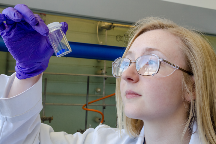 Student examining tub