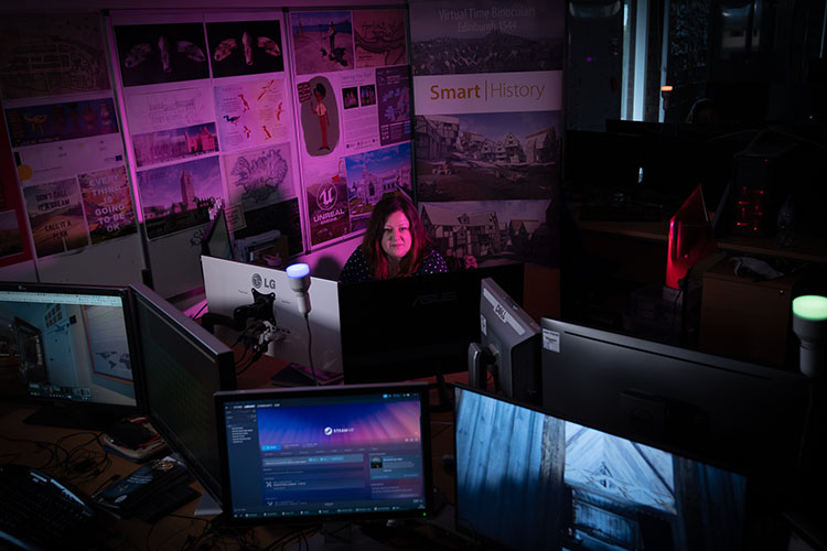 A researcher working at a computer