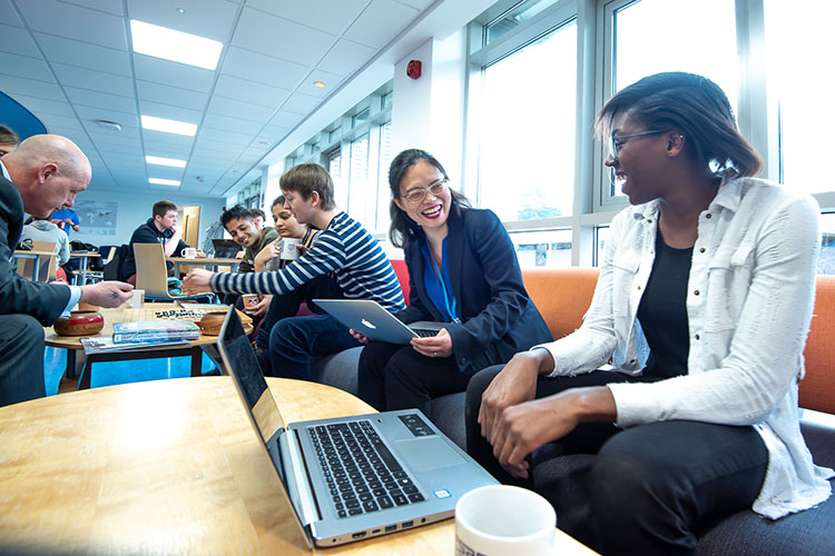 Students and staff interacting