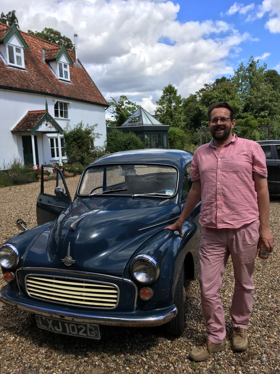 Marcus Plested stands beside his 1968 Morris Minor