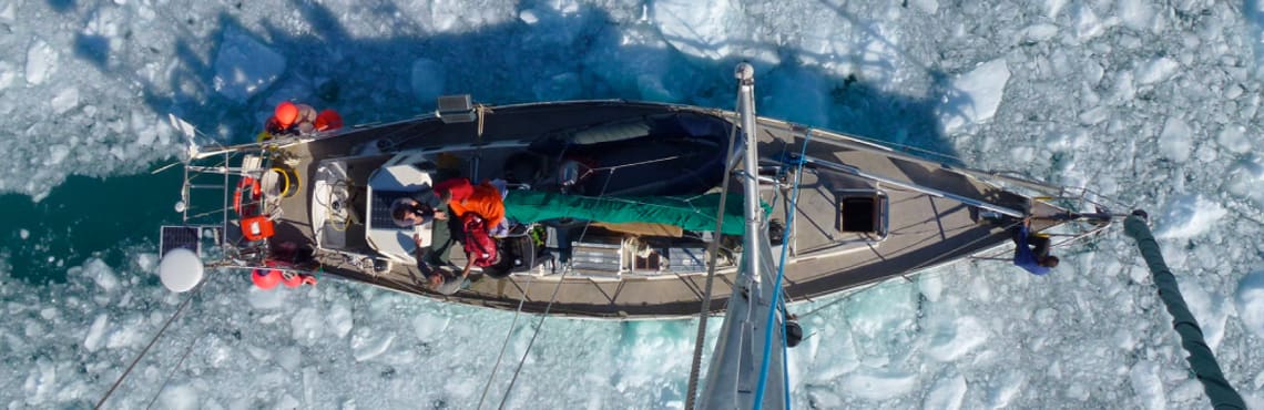 Aerial picture of boat in frozen sea, Greenland
