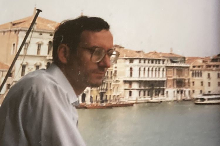 Photograph of George Jack looking out over water