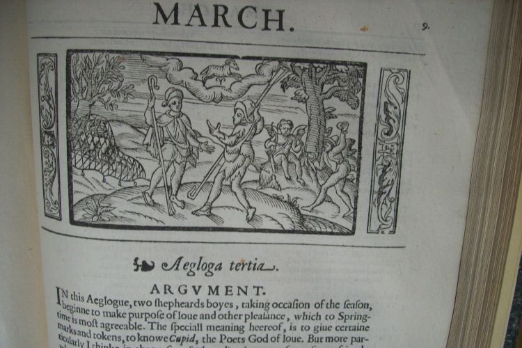 A book from the Neil Rhodes collection open on a page showing an illustration of a country scene