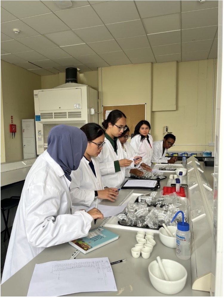 Students working with samples in the lab.
