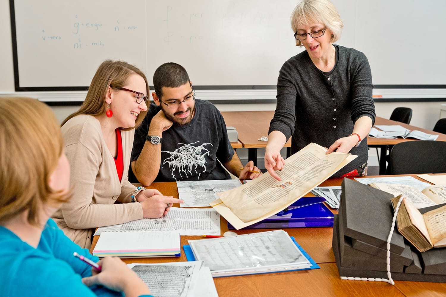 Postgraduates taking a Paleography Class