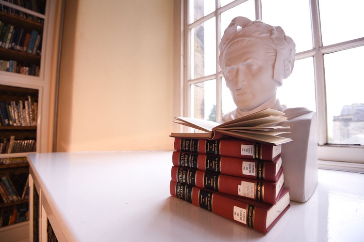 Bust with books in window of King James VI Library