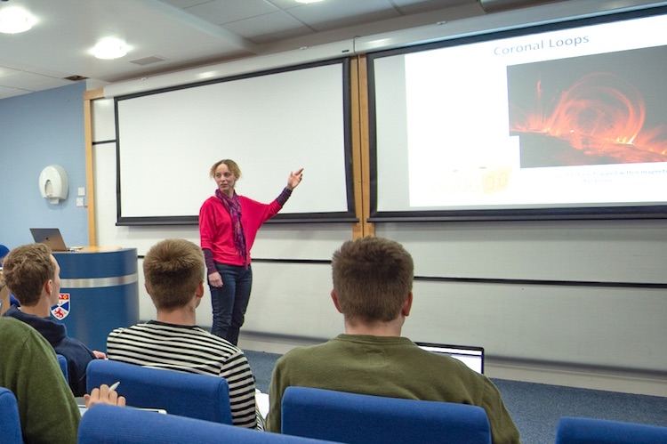 Students at lecture on coronal loops