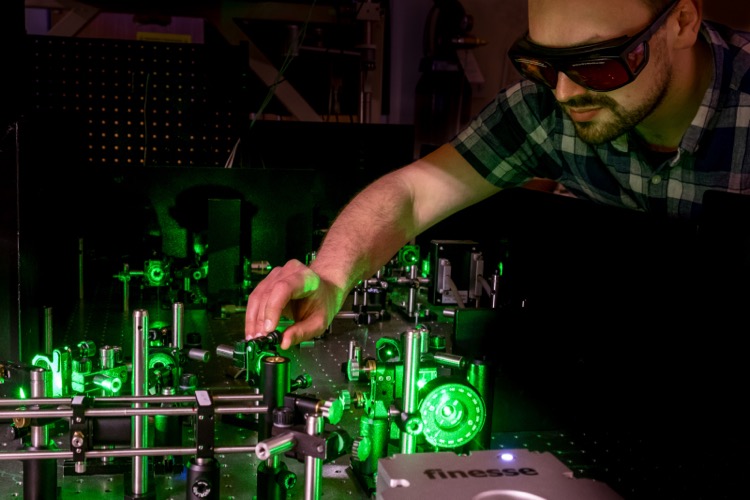 Manipulating laser beams in our research labs.