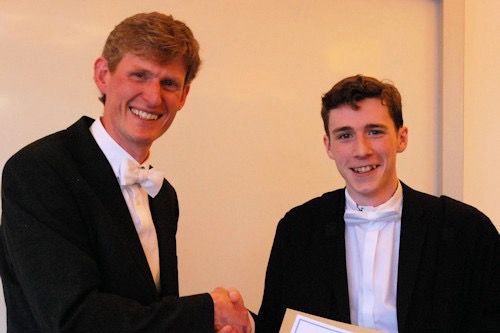 Adam receiving the projectprize certificate from Head of School.