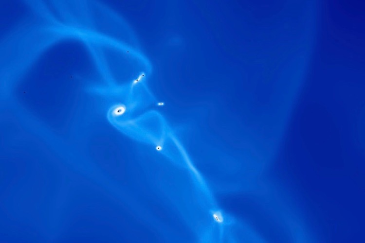 Swirls where stars evolve are shown on a blue background.