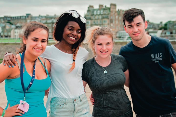 Students together on the beach