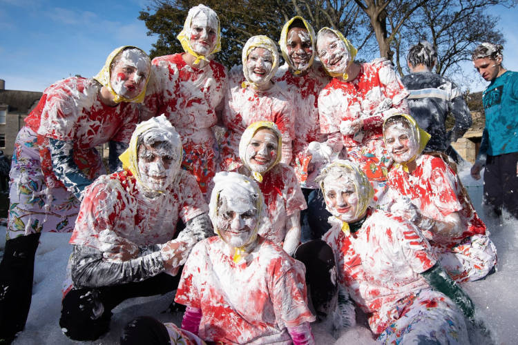Students enjoying the traditional foam fight on Raisin Monday at the University of St Andrews