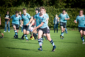Students playing rugby