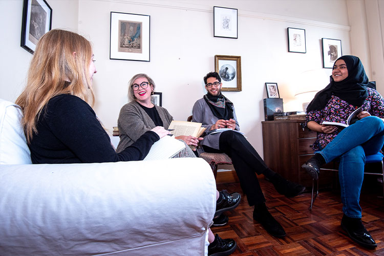 Students in office talking