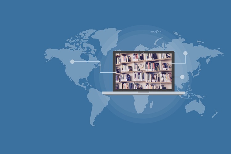 Drawing of a laptop on a map with books on the monitor