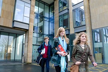Students walking in front of the Arts Building
