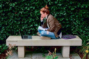 Girl sitting on a bench